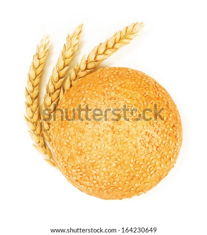 Fresh bread with ears of wheat