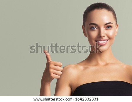 Thumb up woman healthy teeth smile great finger happy smile female
