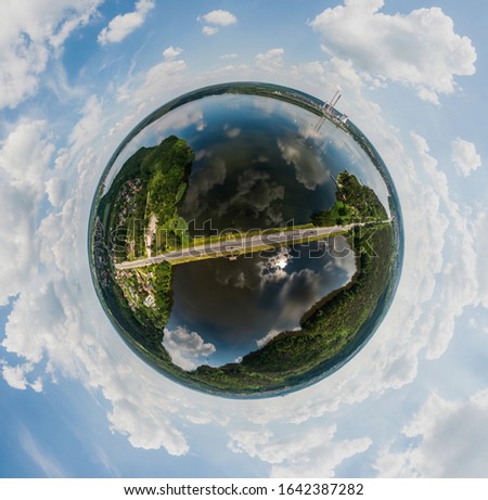Little Planet. Summer background. Globe panorama. 360 degree panorama road across the lake. Rybnik, Poland