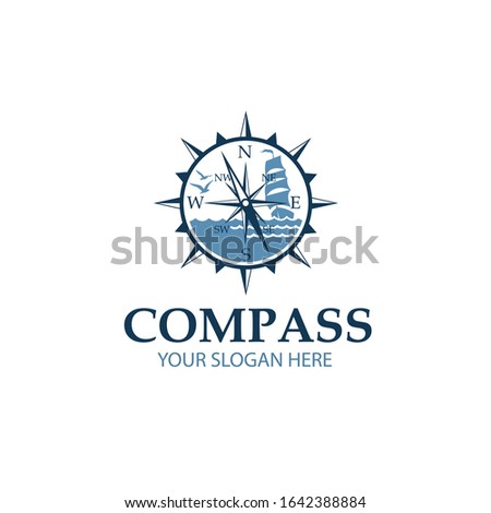 nautical image of compass with sailboat isolated on white background