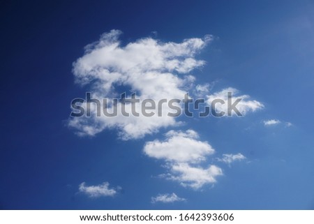 blue sky with clouds that drifted during the day