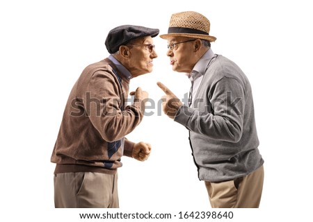 Seniors having an argument isolated on white background Royalty-Free Stock Photo #1642398640