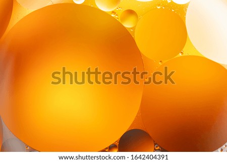 Colorful backdrop with oil drops on water surface. Abstract background.