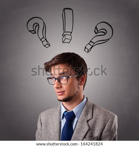 Young man standing and thinking with question marks overhead