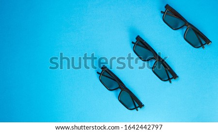 3d glasses isolated in blue background