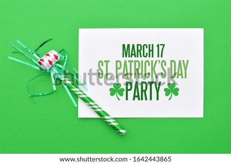 March 17 St. Patrick's Day Party Sign and Party Favor also called Tooty Tooter on green background