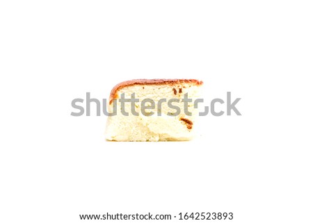A picture of sliced moist cheesecake on white background.