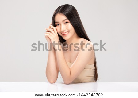 Beautiful Young Asian Woman Holding Hands smile feeling so happy and cheerful with healthy Clean and Fresh skin,isolated on white background,Beauty Cosmetics Concept