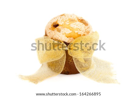 Festive mini panettone decorated with golden bow, on white background.