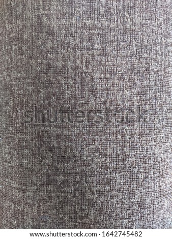 texture of an old sofa fabric in lilac color, close-up.