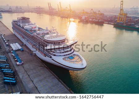 Cruise passengers ship berthing in the port services to the passenger sailing to destination port, restriction quarantine healthcare to all berthing ports Royalty-Free Stock Photo #1642756447