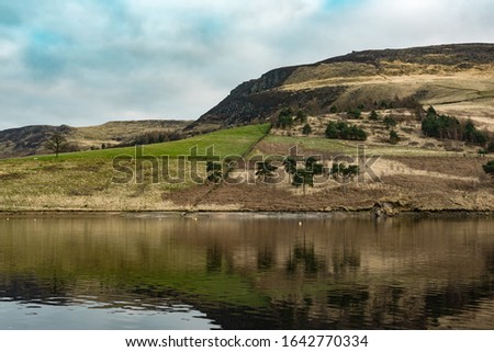 Dovestone Reservoir lies where the valleys of the Greenfield and Chew Brooks converge together above the village of Greenfield, on Saddleworth Moor in Greater Manchester
