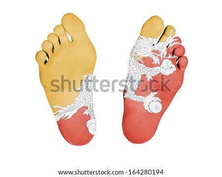 Feet with flag, sleeping or death concept, flag of Bhutan