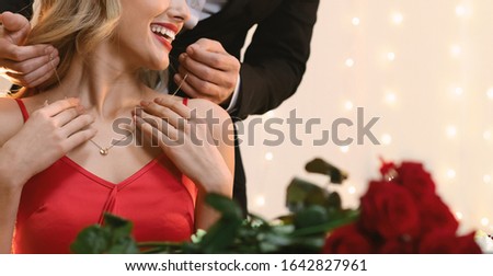 Luxury Gift. Happy Woman Receiving Golden Pendant Necklace And Roses Bouquet For Valentine's Day Or Anniversary, Panorama, Copy Space Royalty-Free Stock Photo #1642827961