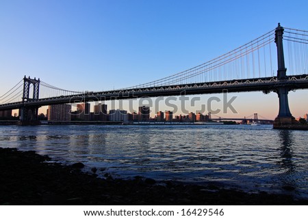 Manhattan Bridge and skyline at dusk, from Brooklyn - New York City, USA