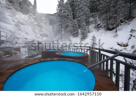 hot water pool in the mountains in winter