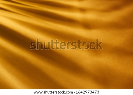 abstract blur grey shadow shade of natural leaves and sun light on yellow background