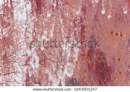 Metal Rust Background Metal Rust Texture. Beautiful unusual background. Rusted painted metal wall. Rusty old background with streaks of rust. Rust stains.