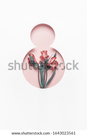 Number 8 hole and flowers. March 8th concept. Greeting Card Women's Day on March 8th. Royalty-Free Stock Photo #1643023561