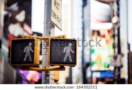 Keep walking New York traffic sign with illuminated and blurred background
