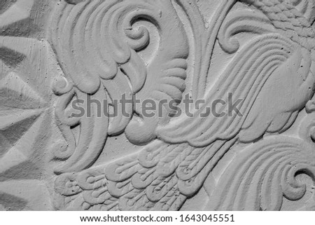 old antique floral wall stucco molding flowers ornate texture background closeup 