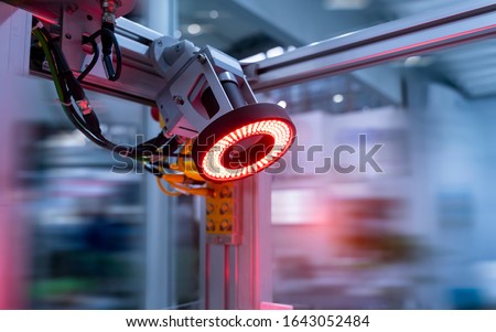 smart robot in manufacturing industry for industry 4.0 and technology concept. Robotic vision sensor camera system in intellegence factory Royalty-Free Stock Photo #1643052484