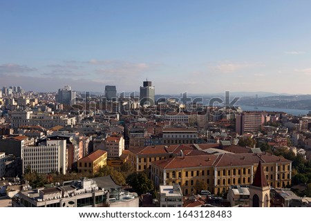 Historical Galatasaray High School in Taksim Beyoglu district. Istanbul cityscape, buildings and Bosphorus. Horizontal aerial view, blue sky in the background.