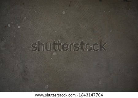 
The cement floor has marks on the number 4.