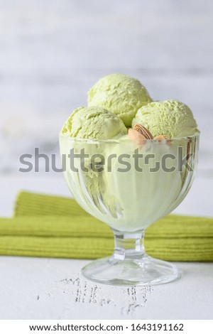 Pistachio ice-cream in a glass vase