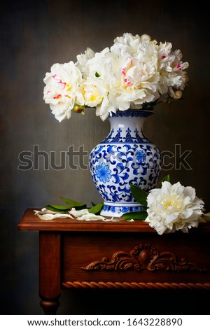 Still life with white peonies in a chinese vase Royalty-Free Stock Photo #1643228890