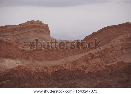 arid desert landscape on cloudy day
