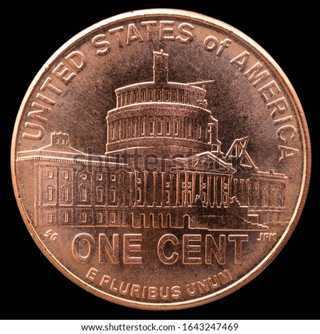 One dime coin. USA. Isolated on a black background.