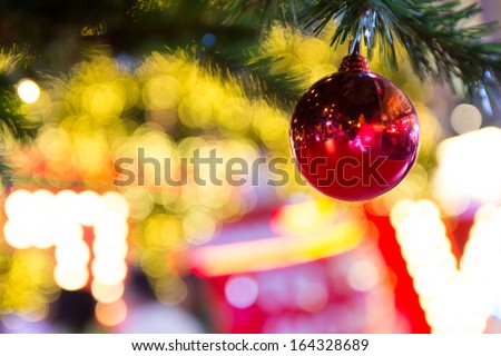 Christmas ball decoration against lights blurred background
