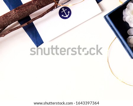 background with blank space and special decorative elements to celebrate the first sea-style communion in blue and white volumes