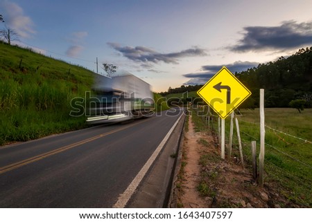 Vertical signage on MG 353 highway, between the cities of Guarani and Piraúba, Minas Gerais state, Brazil