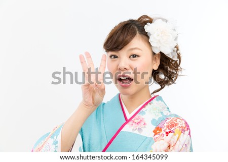 Beautiful asian kimono woman on white background 