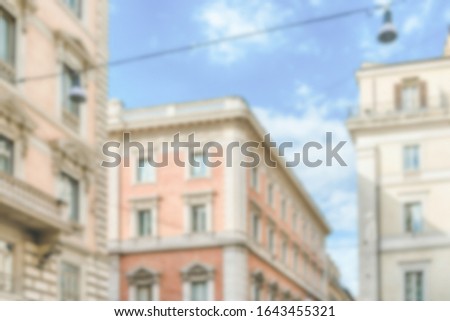 Defocused background of Via del Corso, Rome, Italy. Intentionally blurred post production for bokeh effect