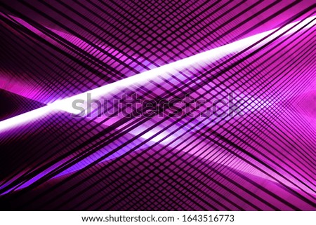 Rays of light passing through diffusing lath screens. Abstract close-up studio photo on the subject of science, optics, hi-tech, innovation, modern industry or technology.