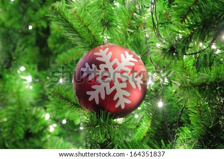 Green Chirstmas tree with Ball and light for winter season.