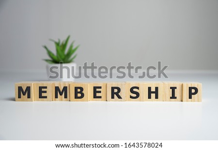 focus on wooden blocks with letters making Membership text. Concept image. Royalty-Free Stock Photo #1643578024