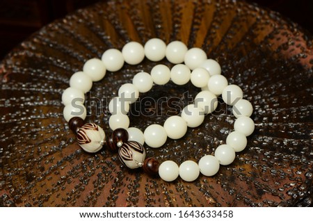 White jade Bodhi bracelet on the background of retro style