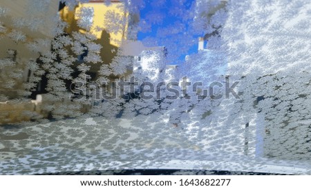 Frost on a car windshield, inside view