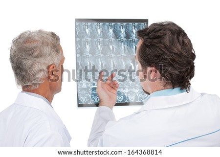 Close up of two doctors discussing diagnose of the patient. Back view, isolated on white background 