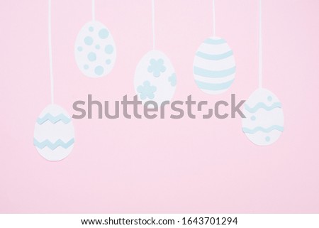 decoration Happy Easter holiday background concept.Flat lay colorful Easter eggs on pink paper