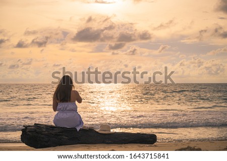 Woman with hat funny relax on the beach in Thailand,Travel concept Banner or background with copy space,Summer background.