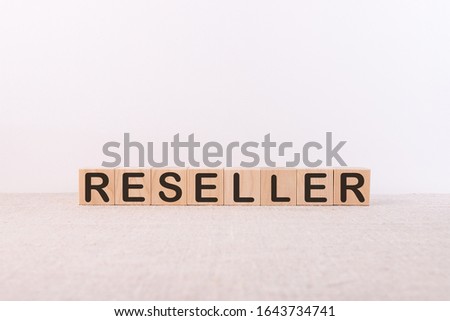RESELLER word from building blocks on a white background