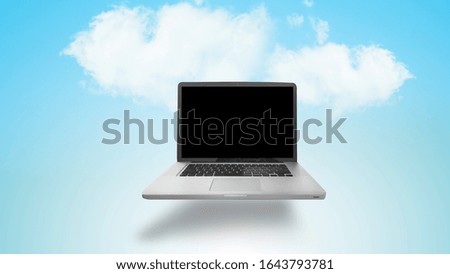 Laptop mock up and clouds decorations. Cloud computing technology concept.