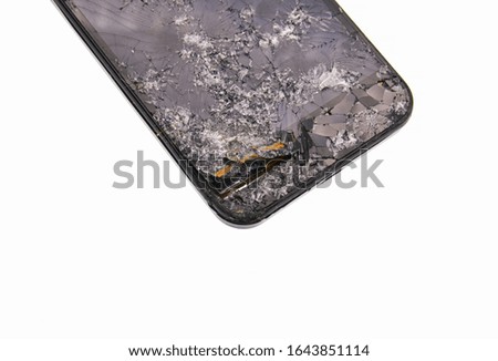 broken cell phone isolated on white background
