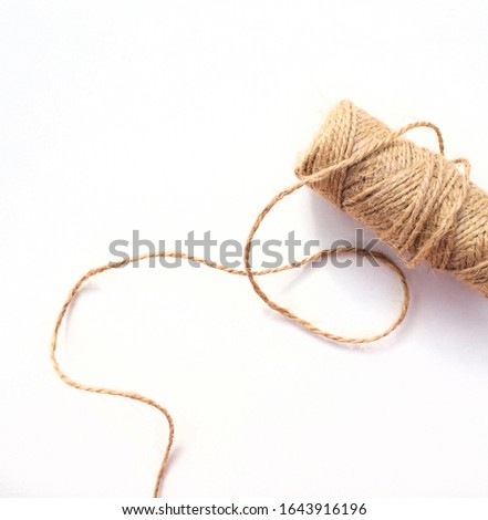 Coil of rope to tie package or make ties for crafts
