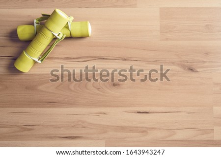 Dumbbells on a wooden floor